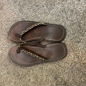 Brown flip flops